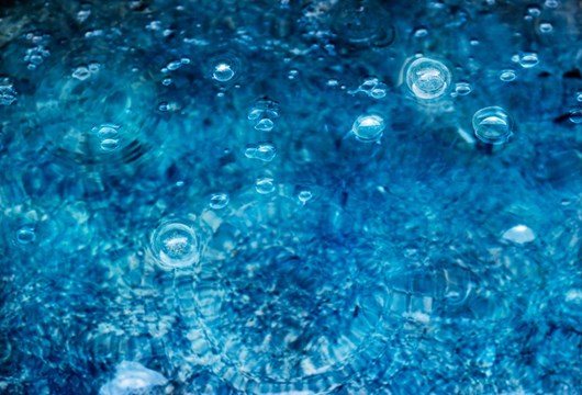 Abstract Blue Water With Bubbles Picture Id583819098